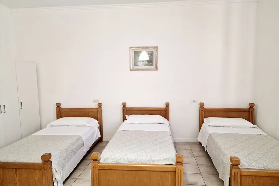 Camera tripla con tre letti singoli